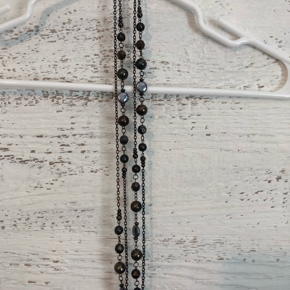 Long beaded necklace.